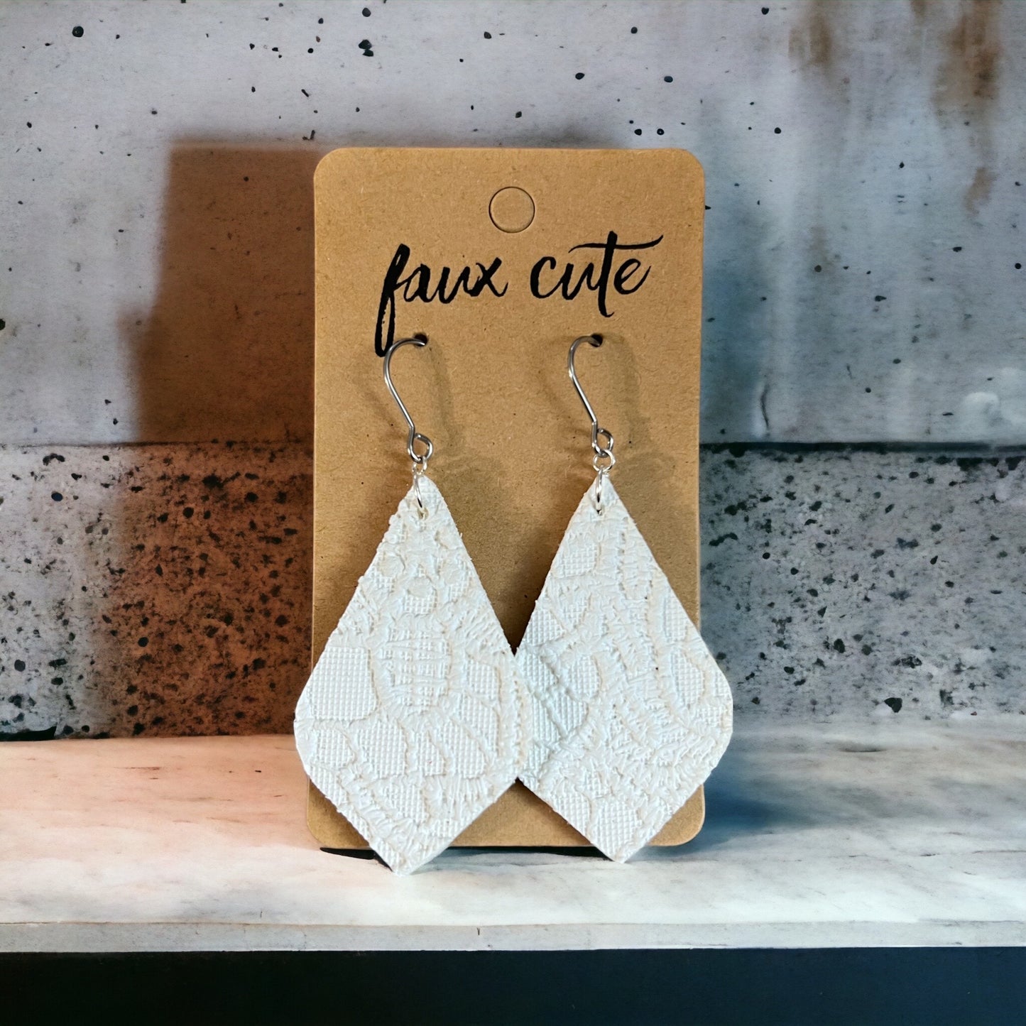 White textured faux leather earrings