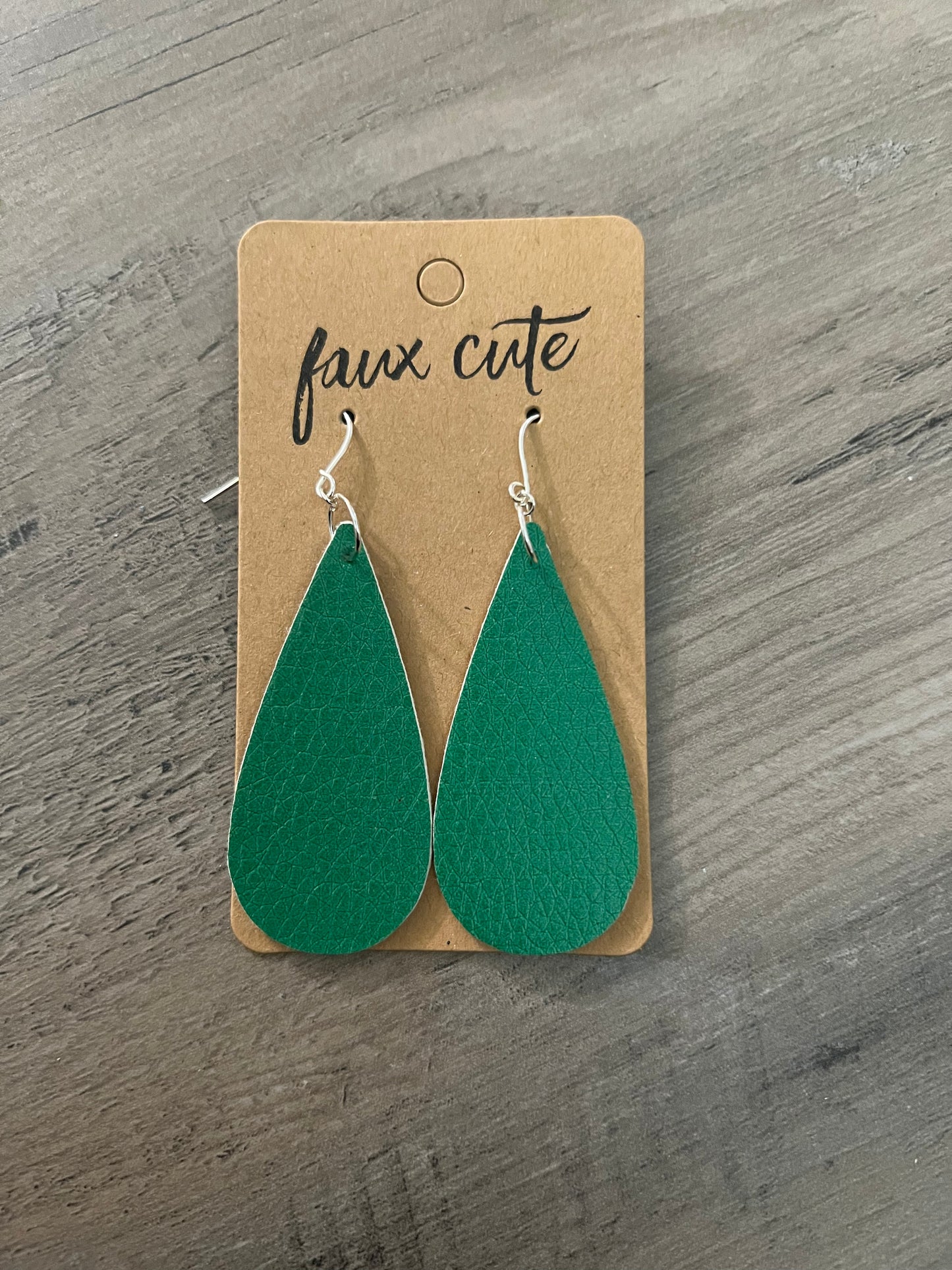 Green teardrop faux leather earrings